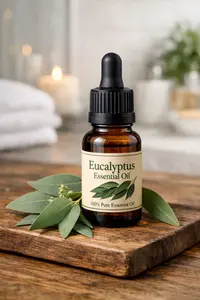 Bottle of Eucalyptus Essential oil with Eucalyptus leaves