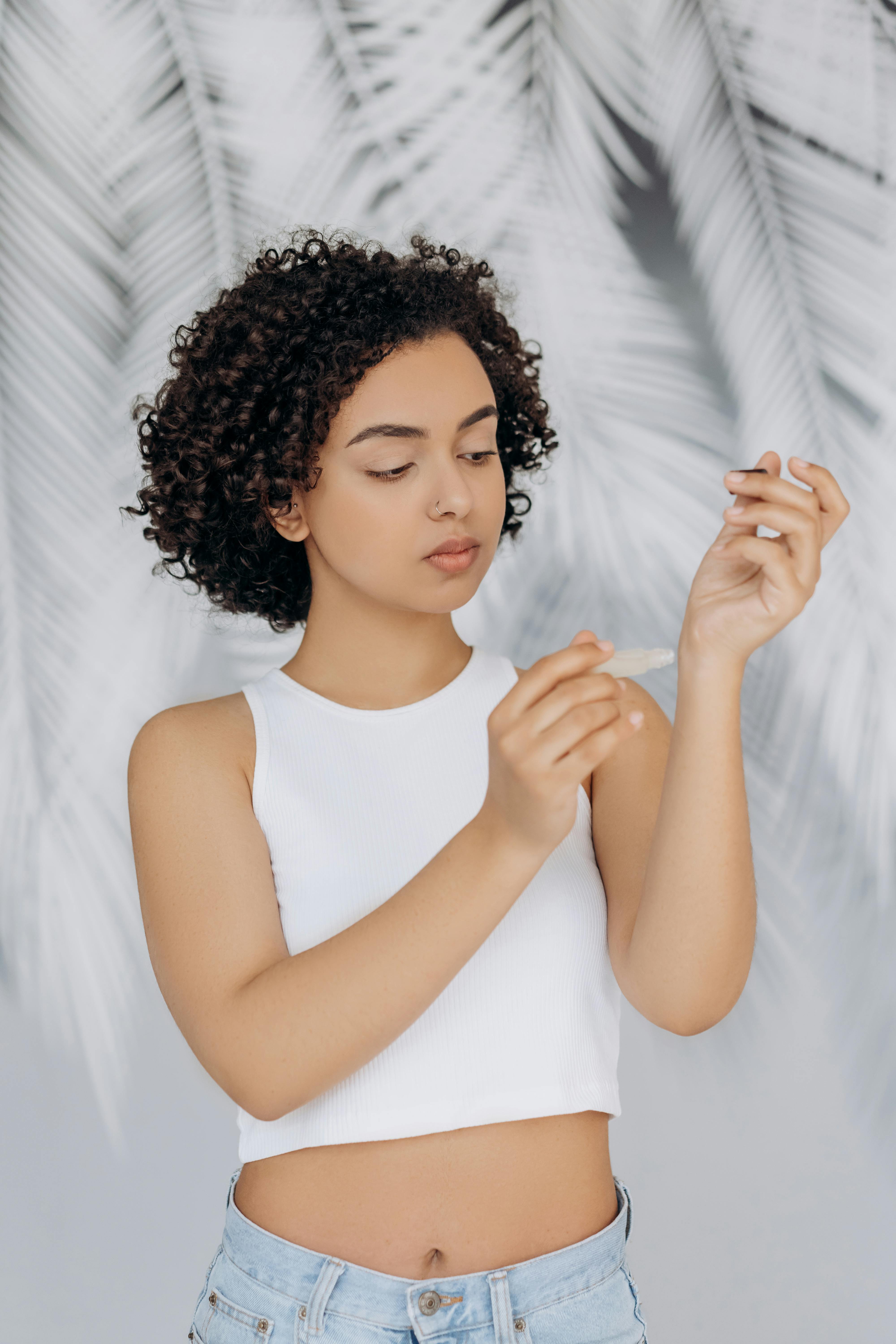 essential oil roller on wrist