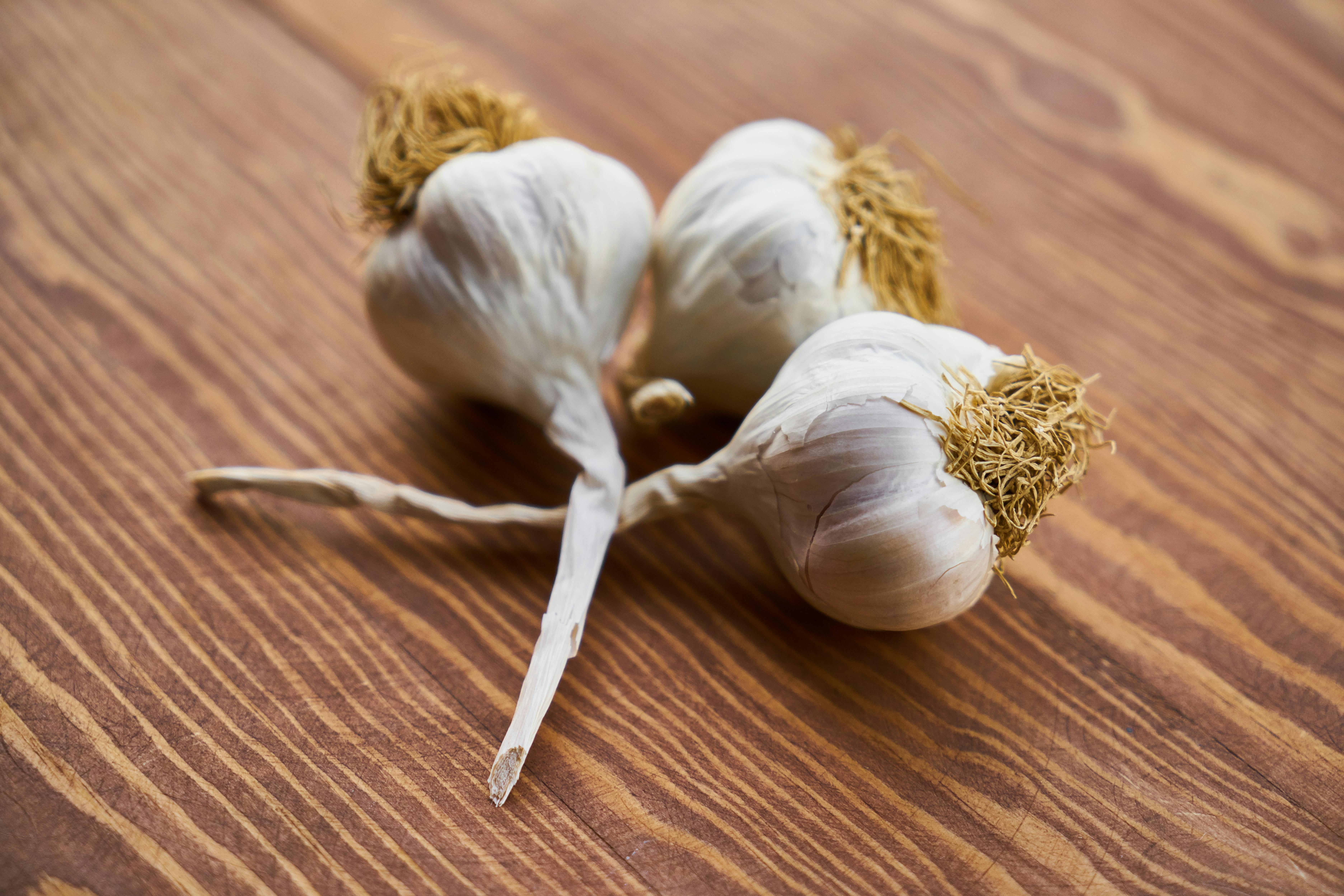 three bulbs of garlic