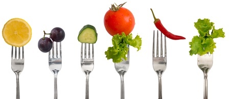 raw vegetables on forks