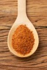 cayenne pepper in a spoon